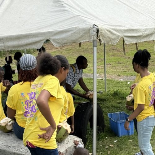 Love of Hearts Foundation members gathering outside of the back-to-school drive
