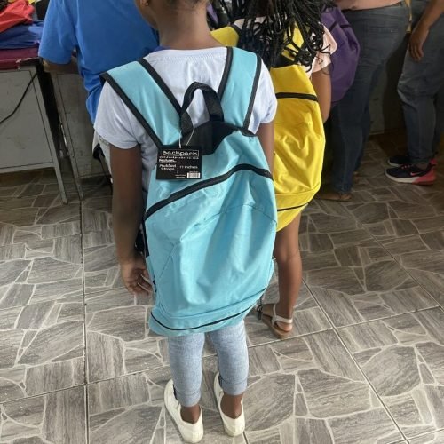 Student with her bag pack received from the Love of Hearts Foundation Back to School Drive 2025