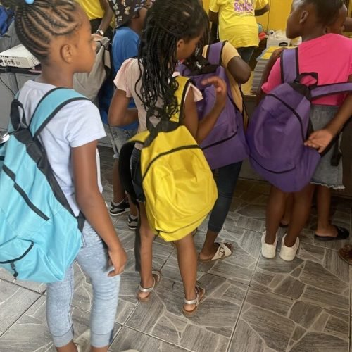 Love of Hearts Foundation Back to School Drive 2025 Students in line to receive their packages